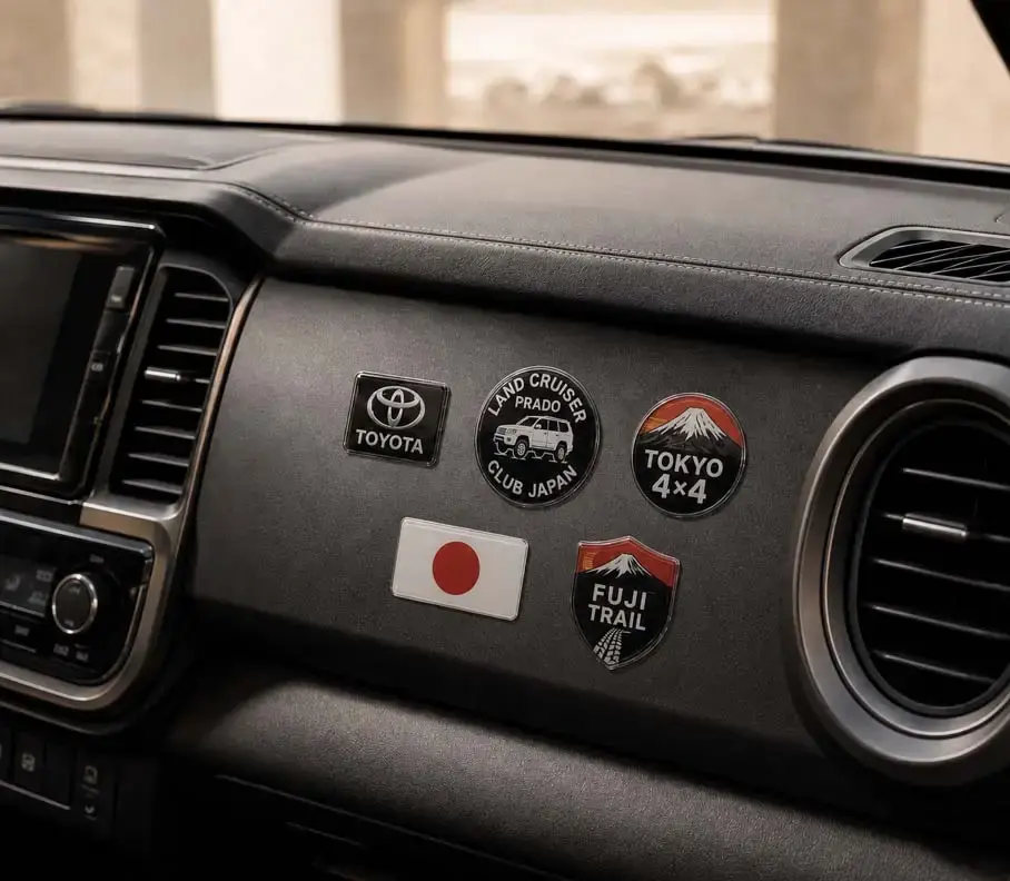 Domed decals and logo stickers on a car dashboard