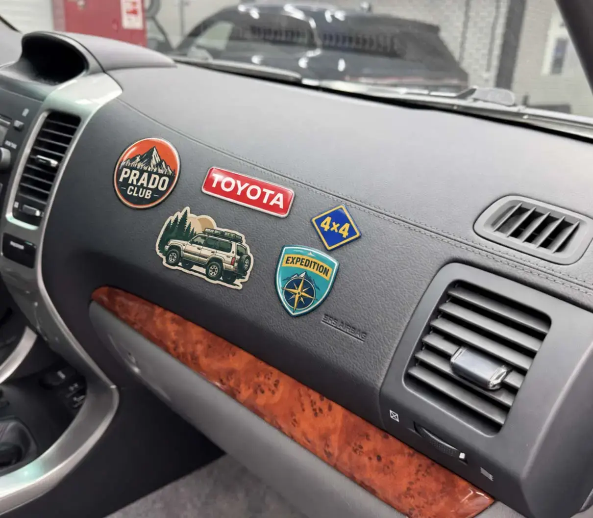 Domed decals on the dashboard of an off-road vehicle