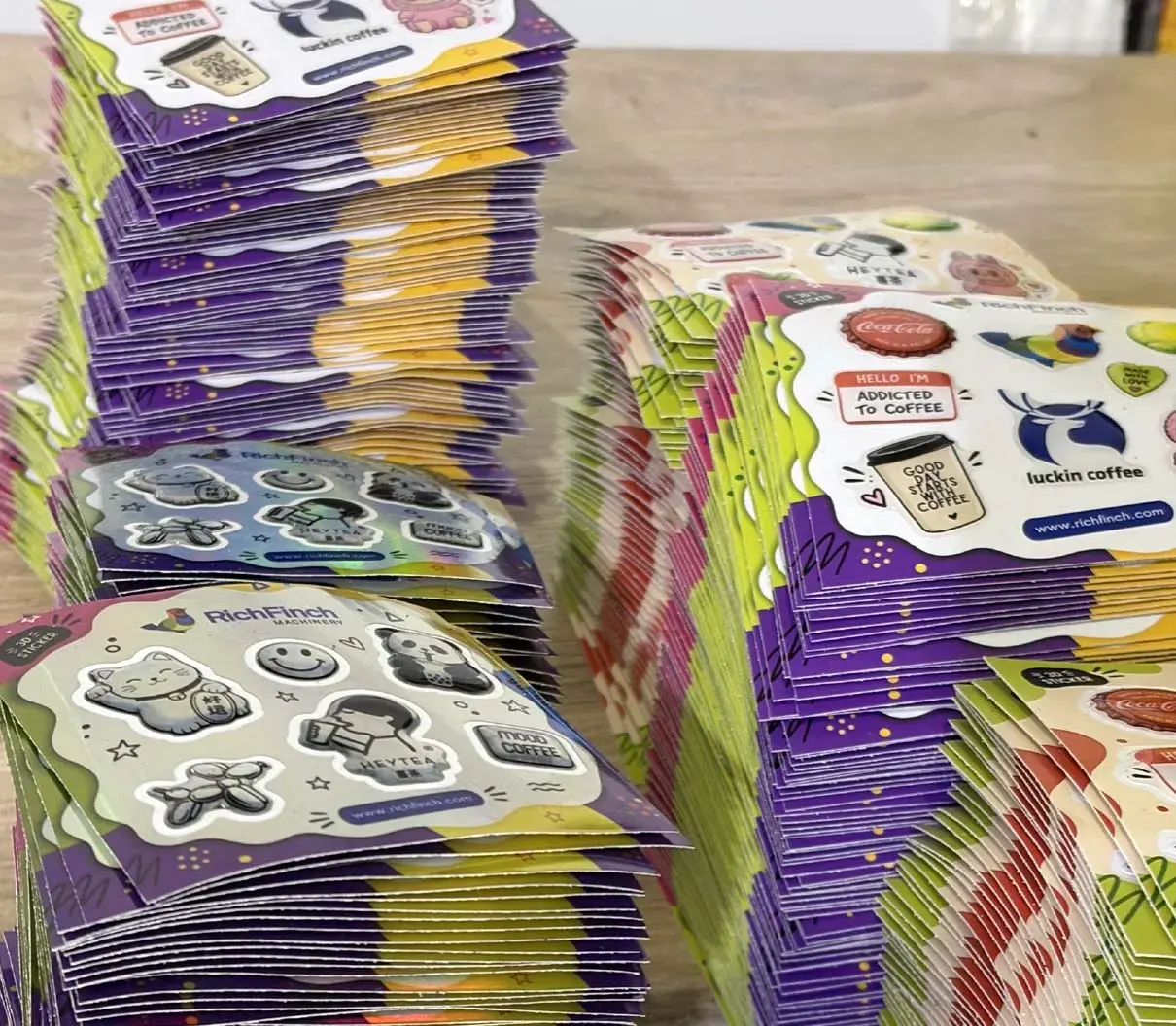 Stacks of packed 3D sticker packs, photographed close