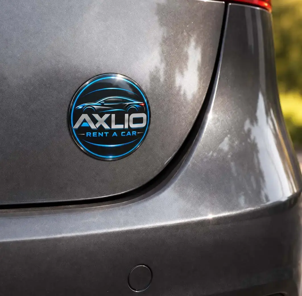 Domed decal on a car body panel, the dome edge catching the light